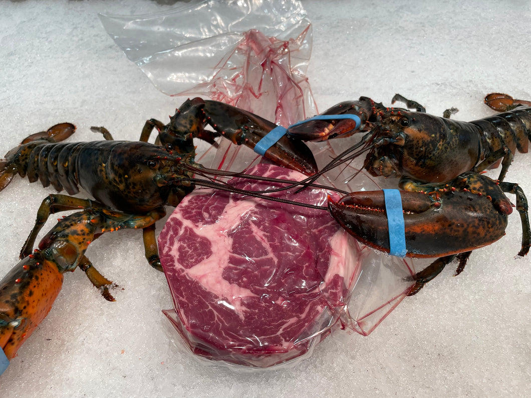 SURF AND TURF 2 1.5 live lobsters & 1 tomahawk 40 oz prime